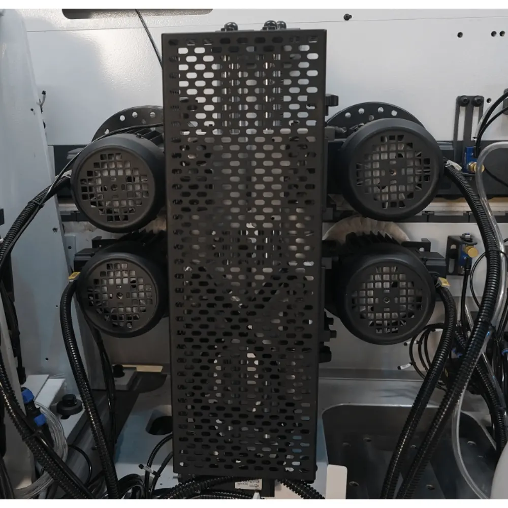 <b>Dual reciprocating buffing units</b><br/>Dual buffing units clean finished panels with reciprocating cotton buffing wheels, leaving the panel surfaces smooth and clean.